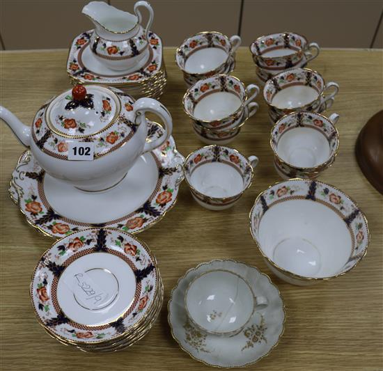 An Imari style teaset and a cup and saucer